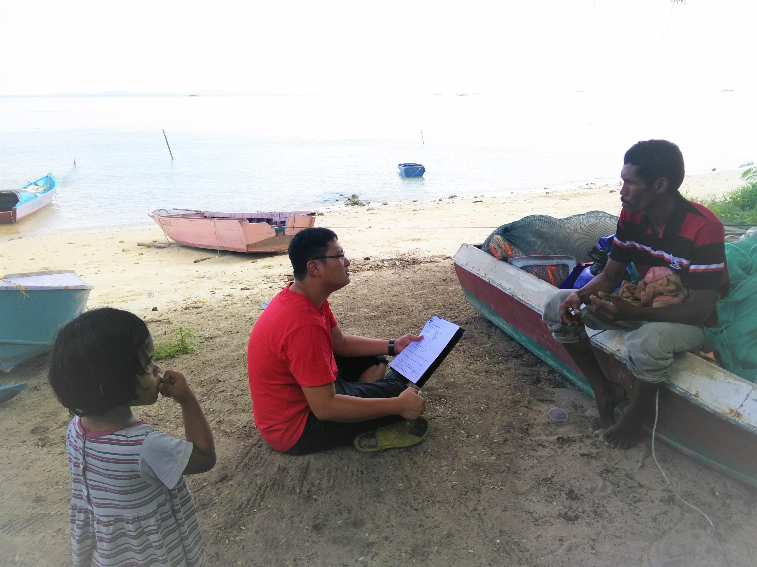 Interviewing a fisherman about their fishing operations in Tun Mustapha Park (TMP), Sabah